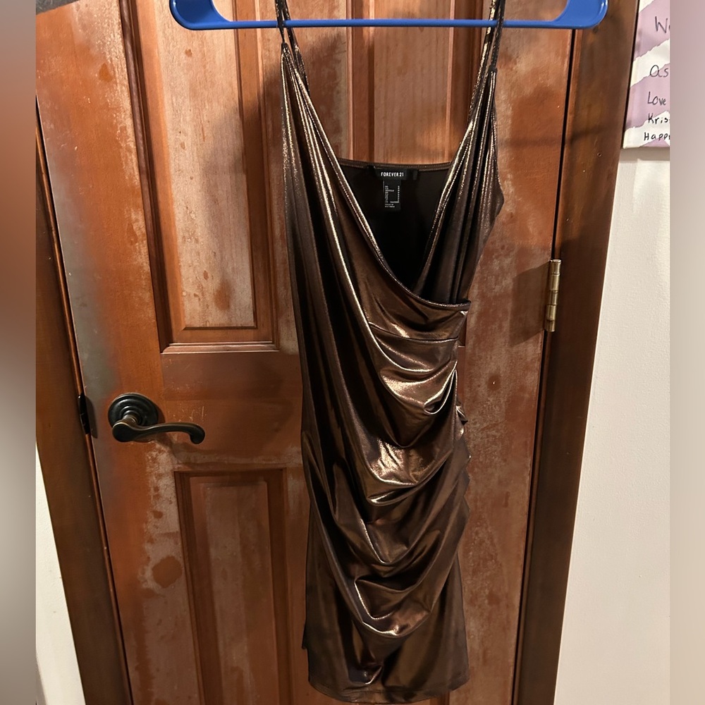 Bronze dress body con with a zipper on the side
